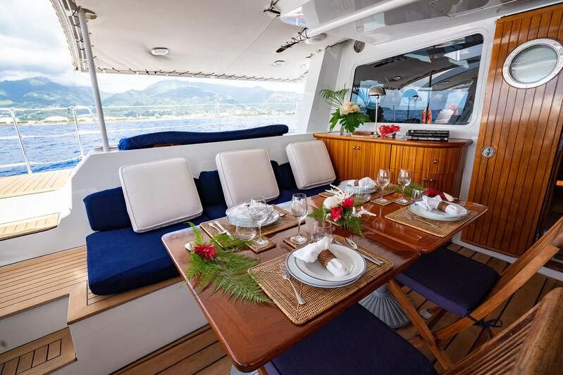 a dining table on a boat aboard DOUCE FRANCE Yacht for Sale