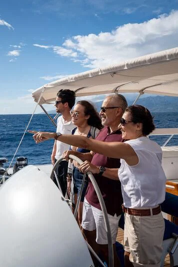 a group of people on a boat aboard DOUCE FRANCE Yacht for Sale