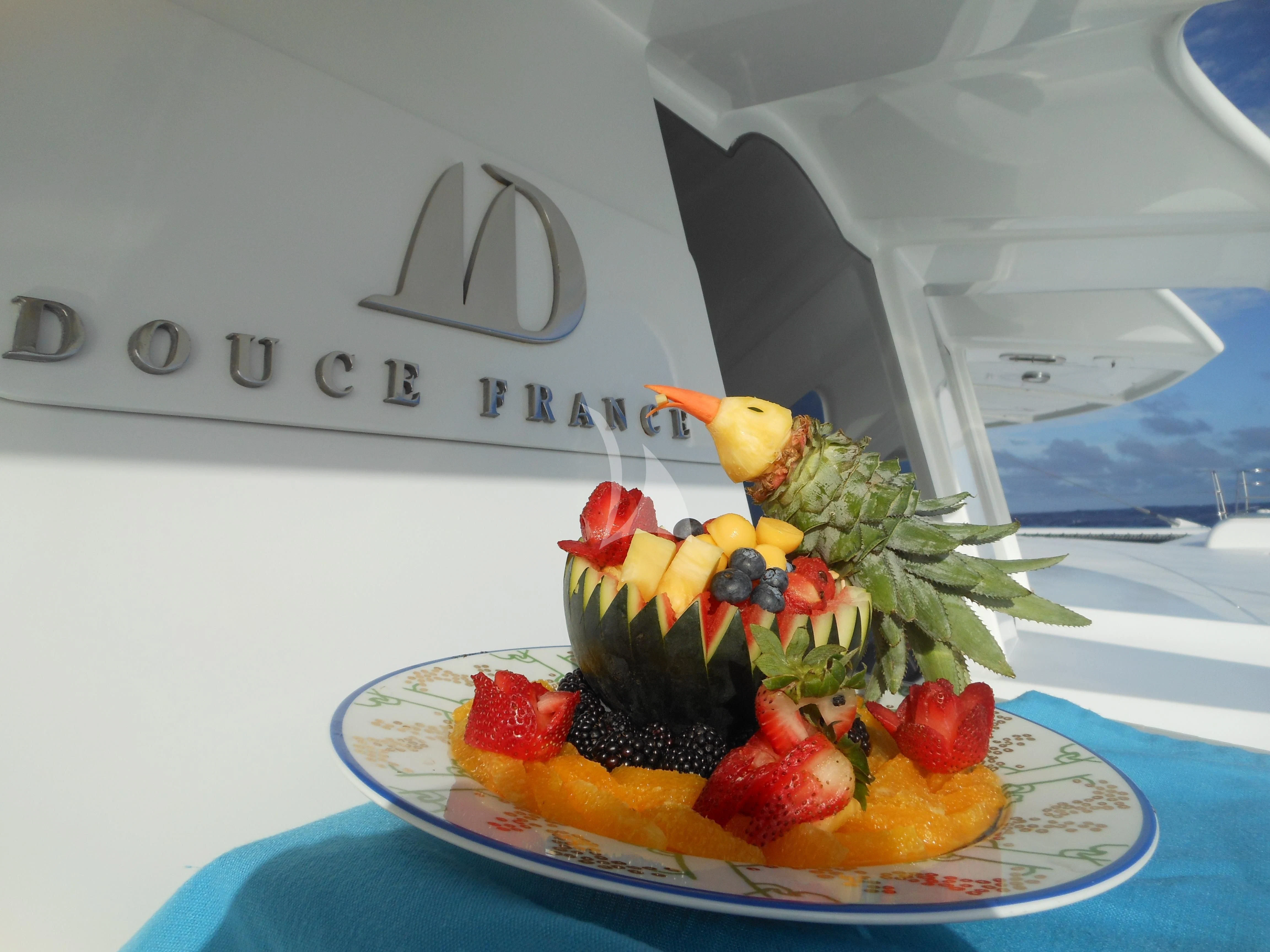 a plate of fruit aboard DOUCE FRANCE Yacht for Sale