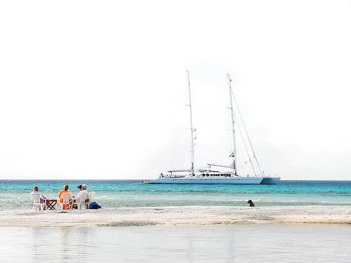 a boat on the beach aboard DOUCE FRANCE Yacht for Sale