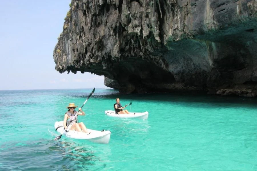 a group of people in a boat in the water aboard DOUCE FRANCE Yacht for Sale