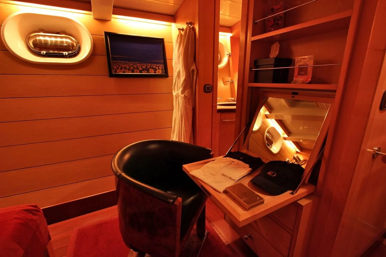 a room with a desk and a chair aboard DOUCE FRANCE Yacht for Sale