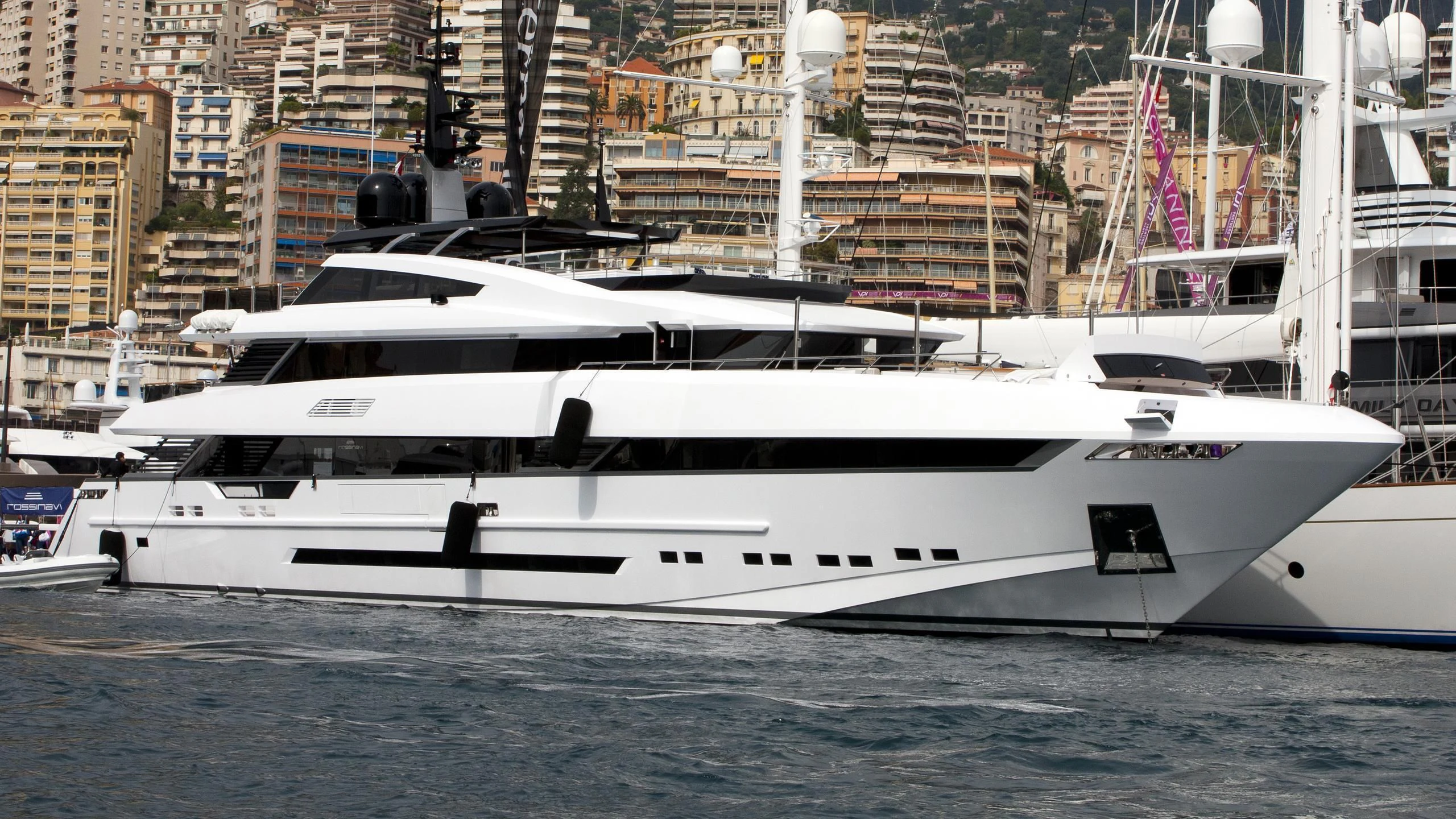 a white yacht in the water aboard PARAM JAMUNA IV Yacht for Sale