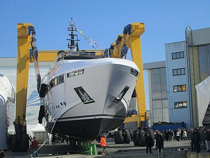 a large machine with a crane aboard PARAM JAMUNA IV Yacht for Sale