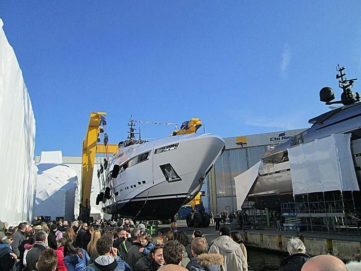 a crowd of people next to a large white plane aboard PARAM JAMUNA IV Yacht for Sale