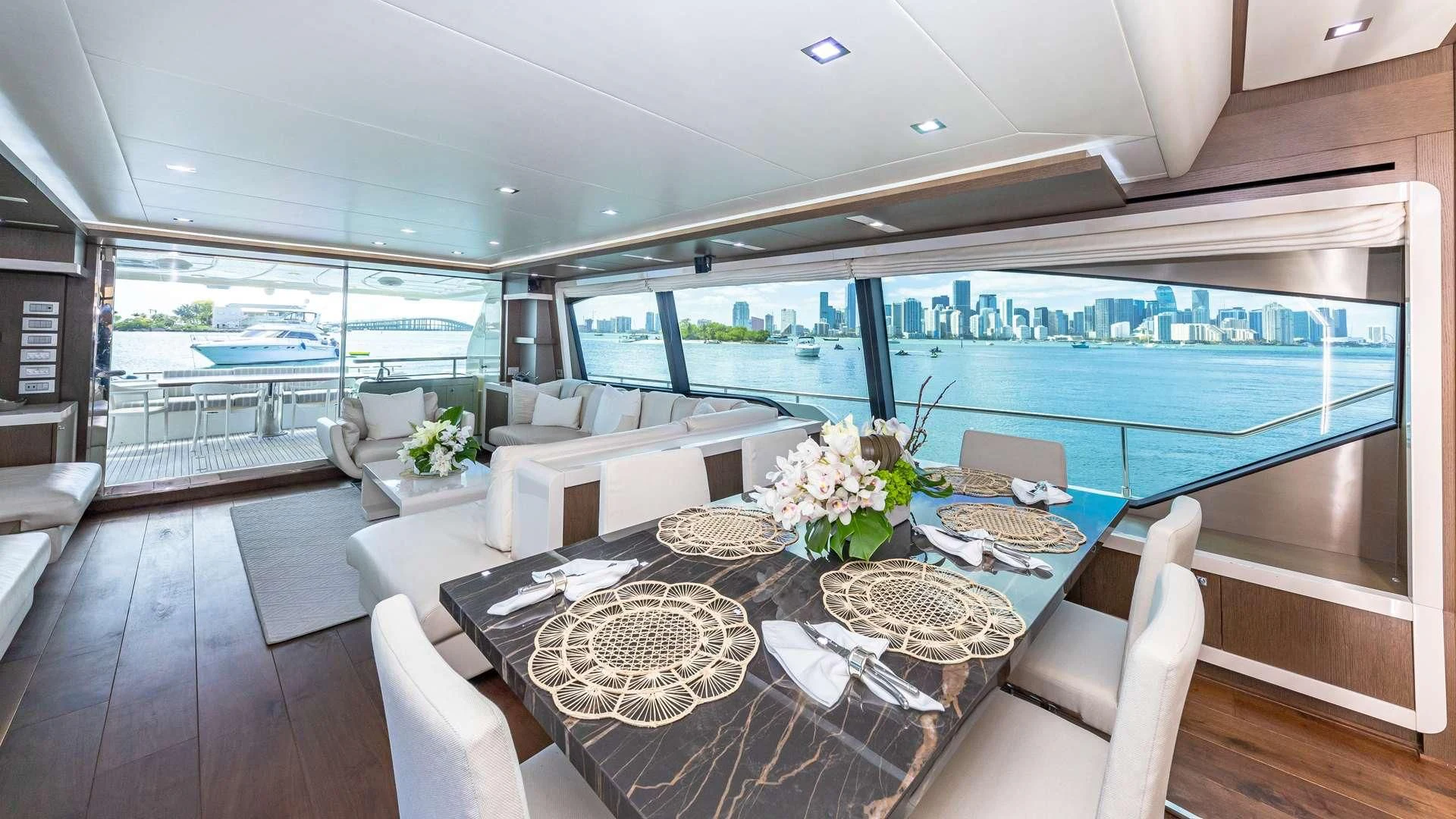 a large living room with a large balcony aboard HOYA SAXA Yacht for Sale