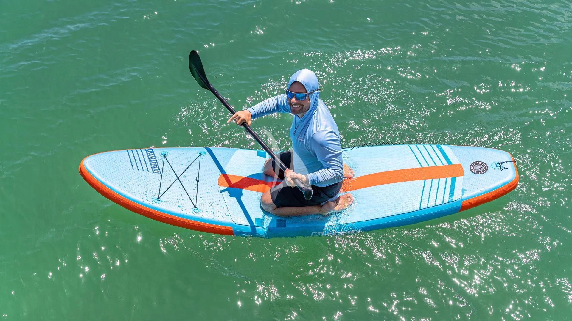 a man in a kayak aboard HOYA SAXA Yacht for Sale