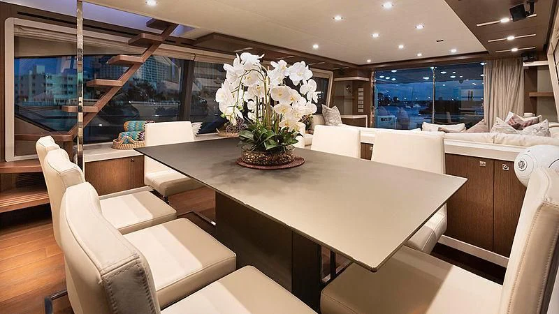 a table with white flowers on it aboard HOYA SAXA Yacht for Sale