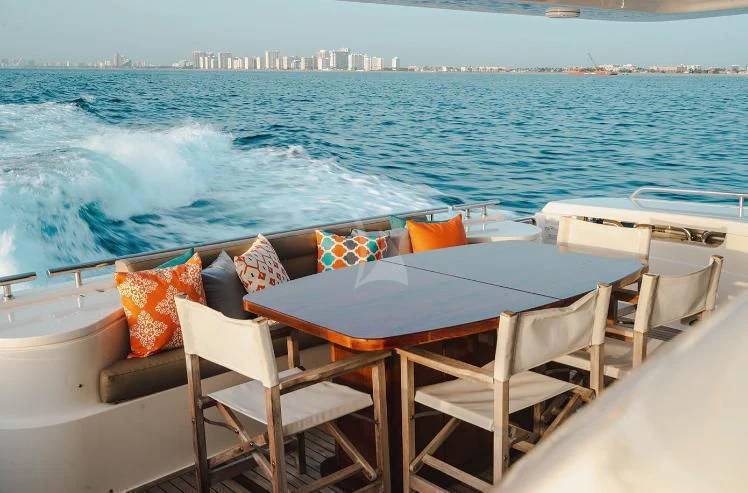 a table and chairs on a boat aboard HOYA SAXA Yacht for Sale