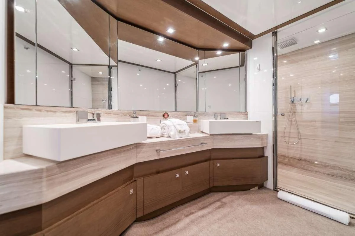 a bathroom with a large tub aboard HOYA SAXA Yacht for Sale
