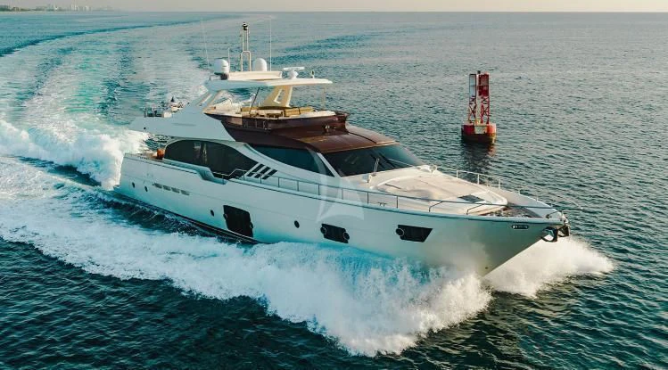 a white boat on the water aboard HOYA SAXA Yacht for Sale