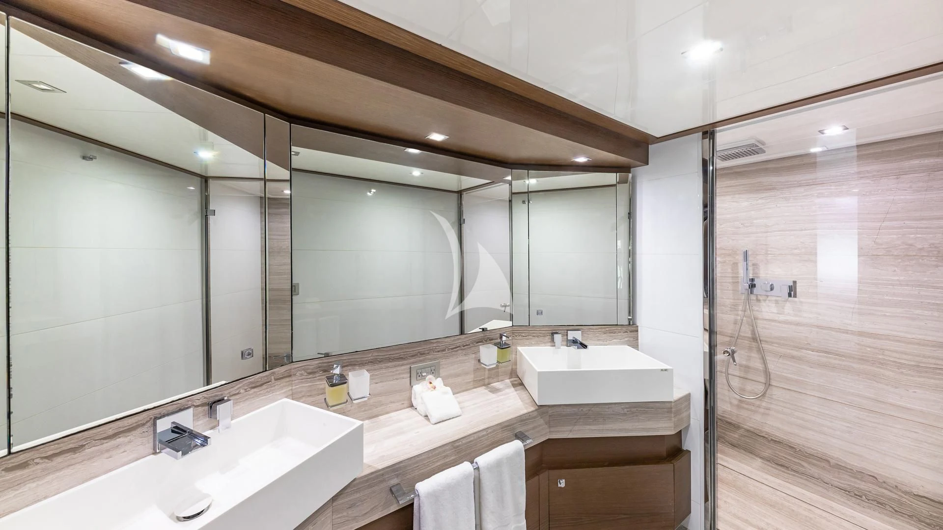 a bathroom with a large mirror aboard HOYA SAXA Yacht for Sale