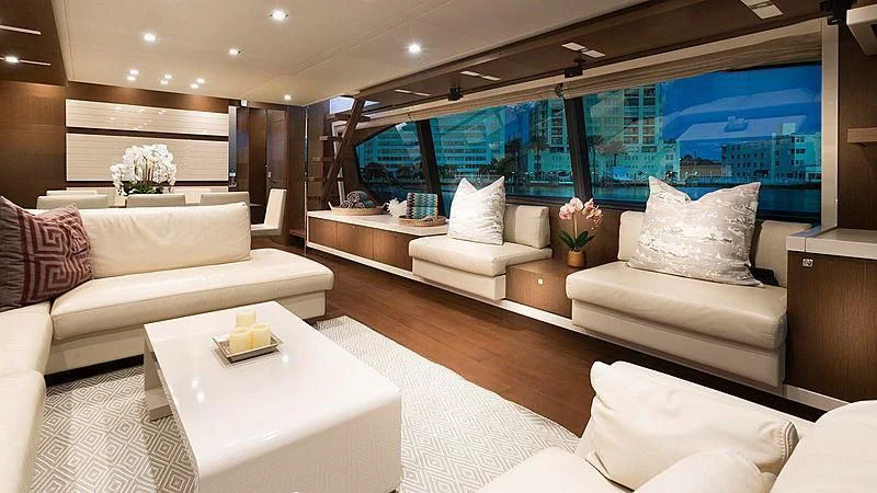 a room with a couch and a table aboard HOYA SAXA Yacht for Sale