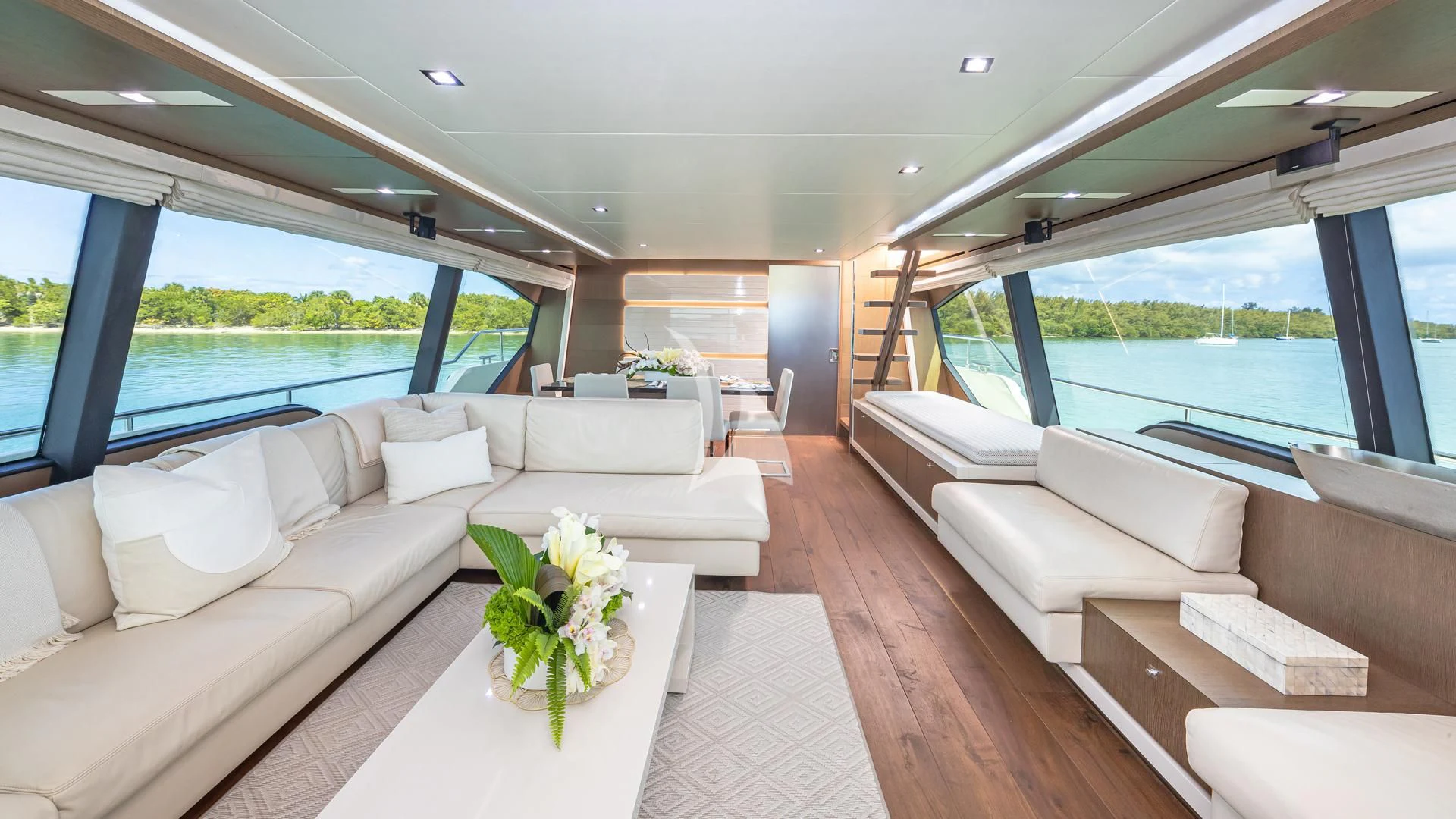 a living room with a large window aboard HOYA SAXA Yacht for Sale