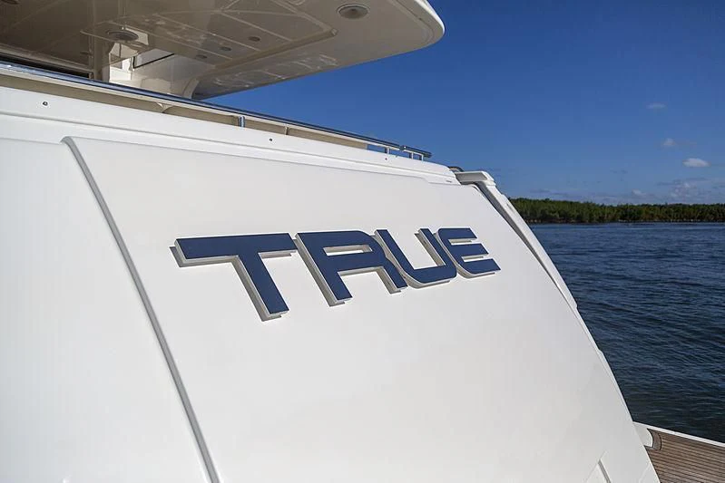 a white boat with a logo on it aboard HOYA SAXA Yacht for Sale