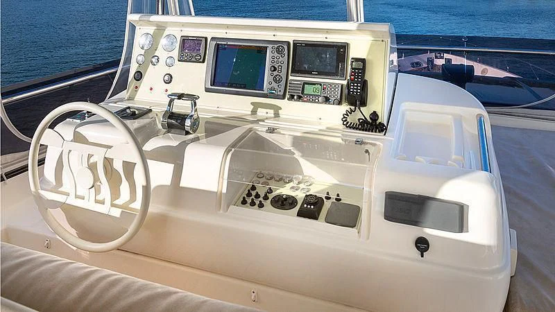 the inside of a white car aboard HOYA SAXA Yacht for Sale