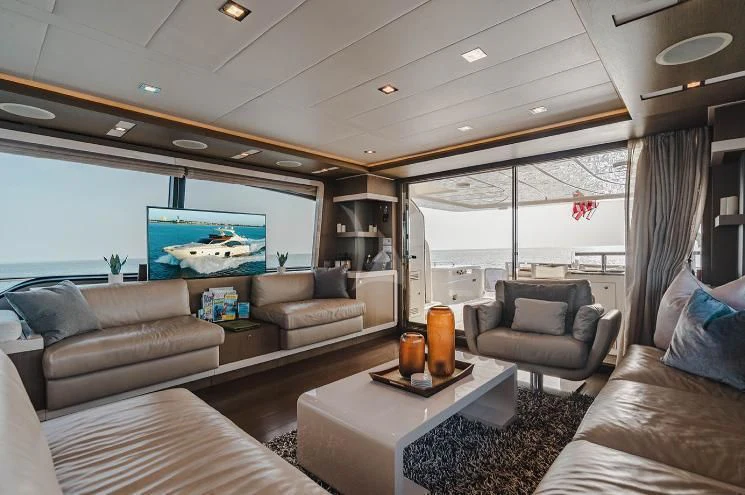 a living room with a large window aboard HOYA SAXA Yacht for Sale