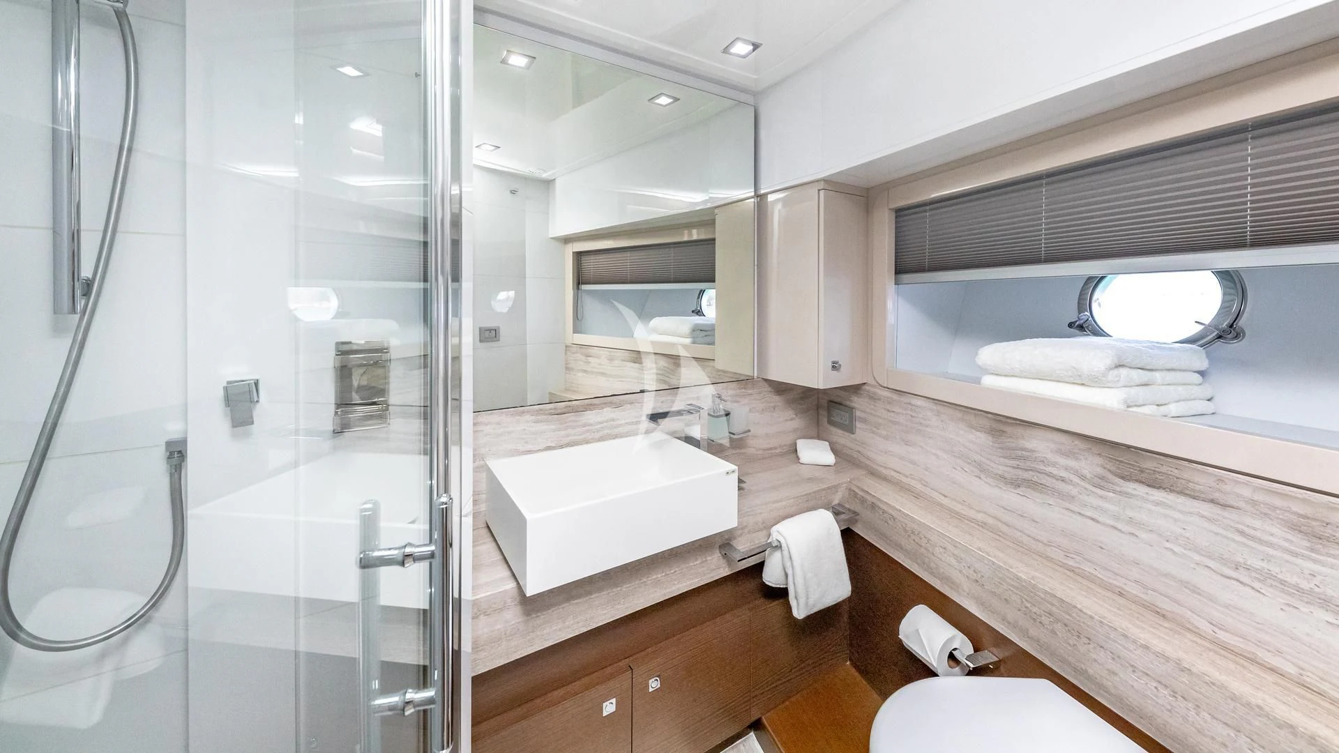 a bathroom with a glass shower aboard HOYA SAXA Yacht for Sale