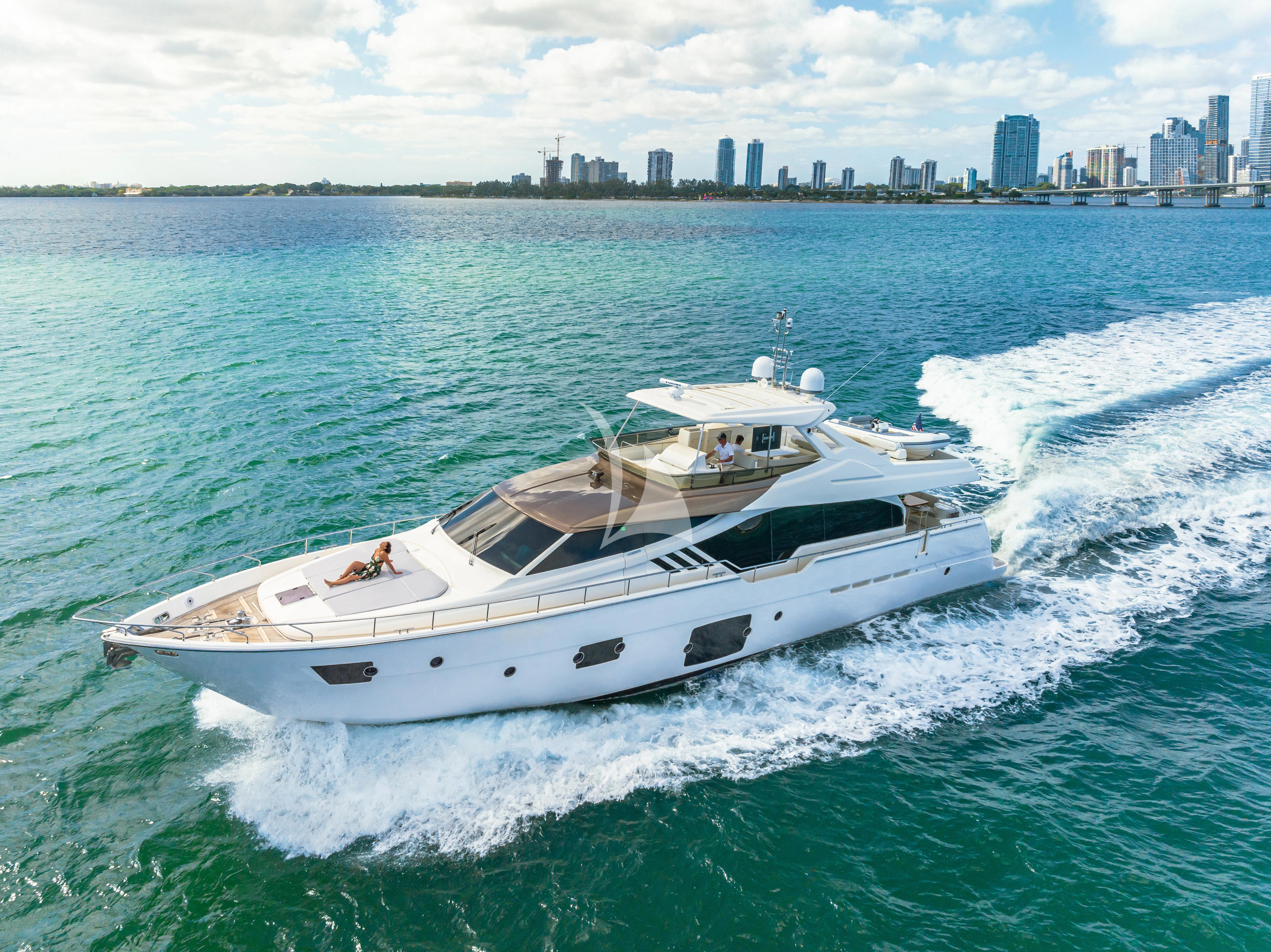a white yacht on the water aboard HOYA SAXA Yacht for Sale
