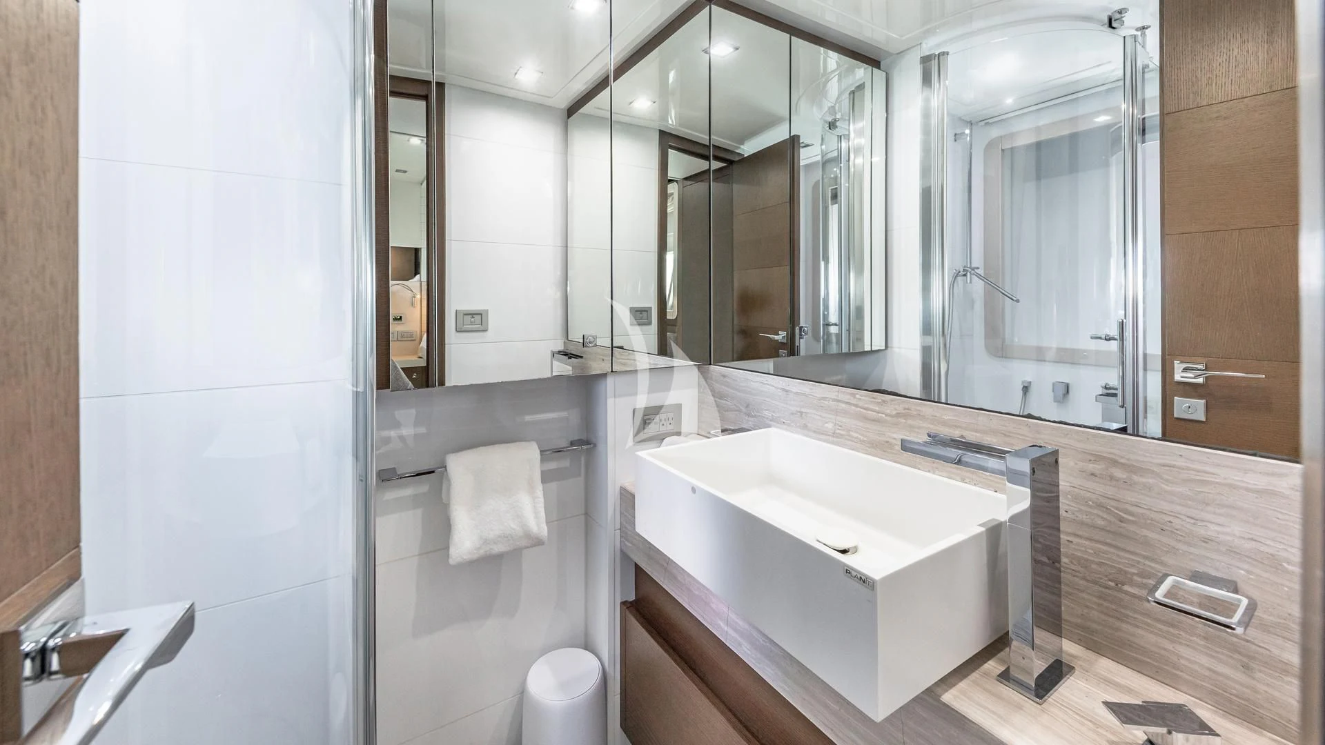 a bathroom with a large mirror aboard HOYA SAXA Yacht for Sale