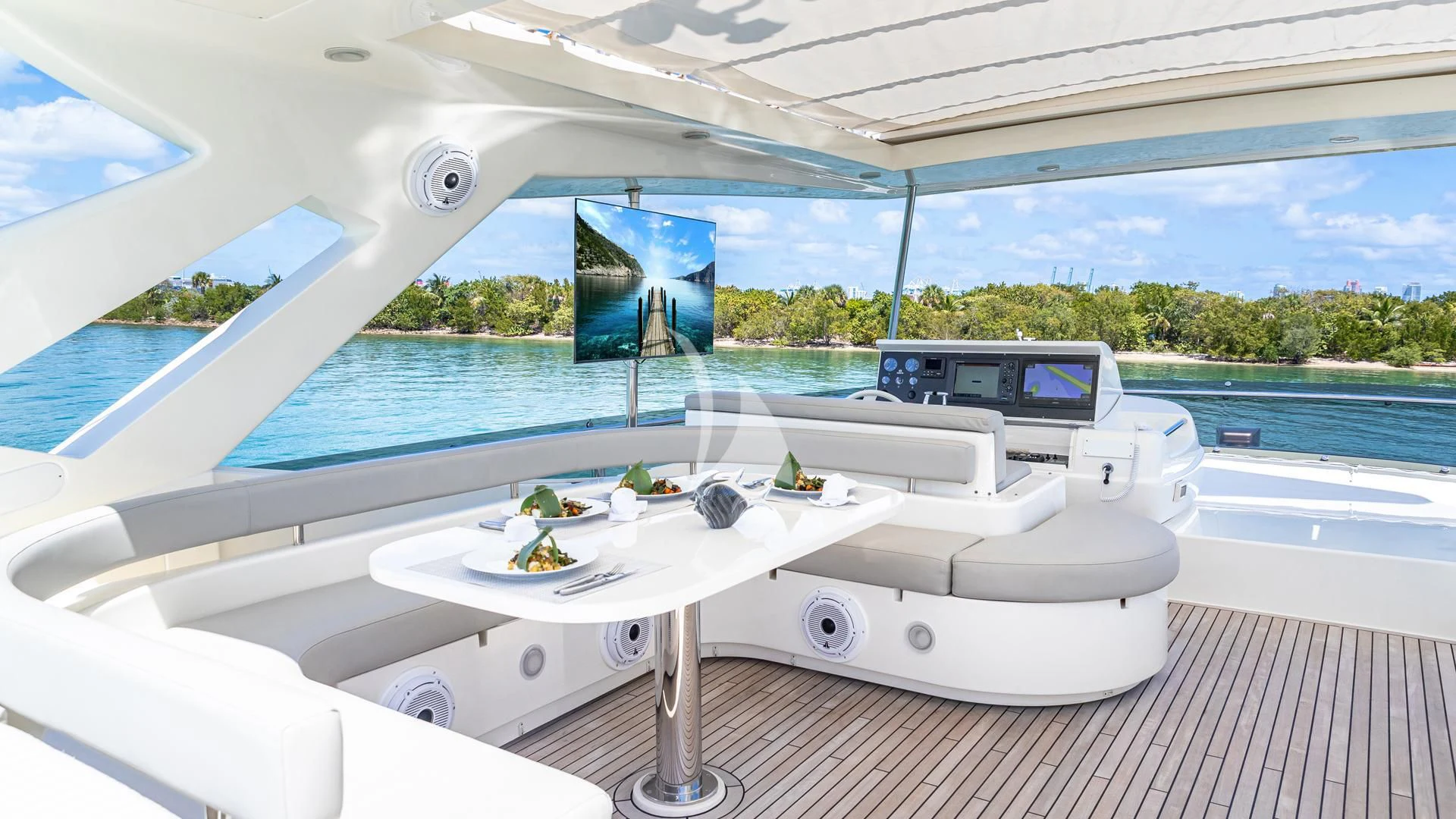 a white table on a deck aboard HOYA SAXA Yacht for Sale