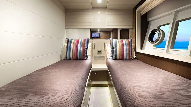 a room with two beds aboard HOYA SAXA Yacht for Sale