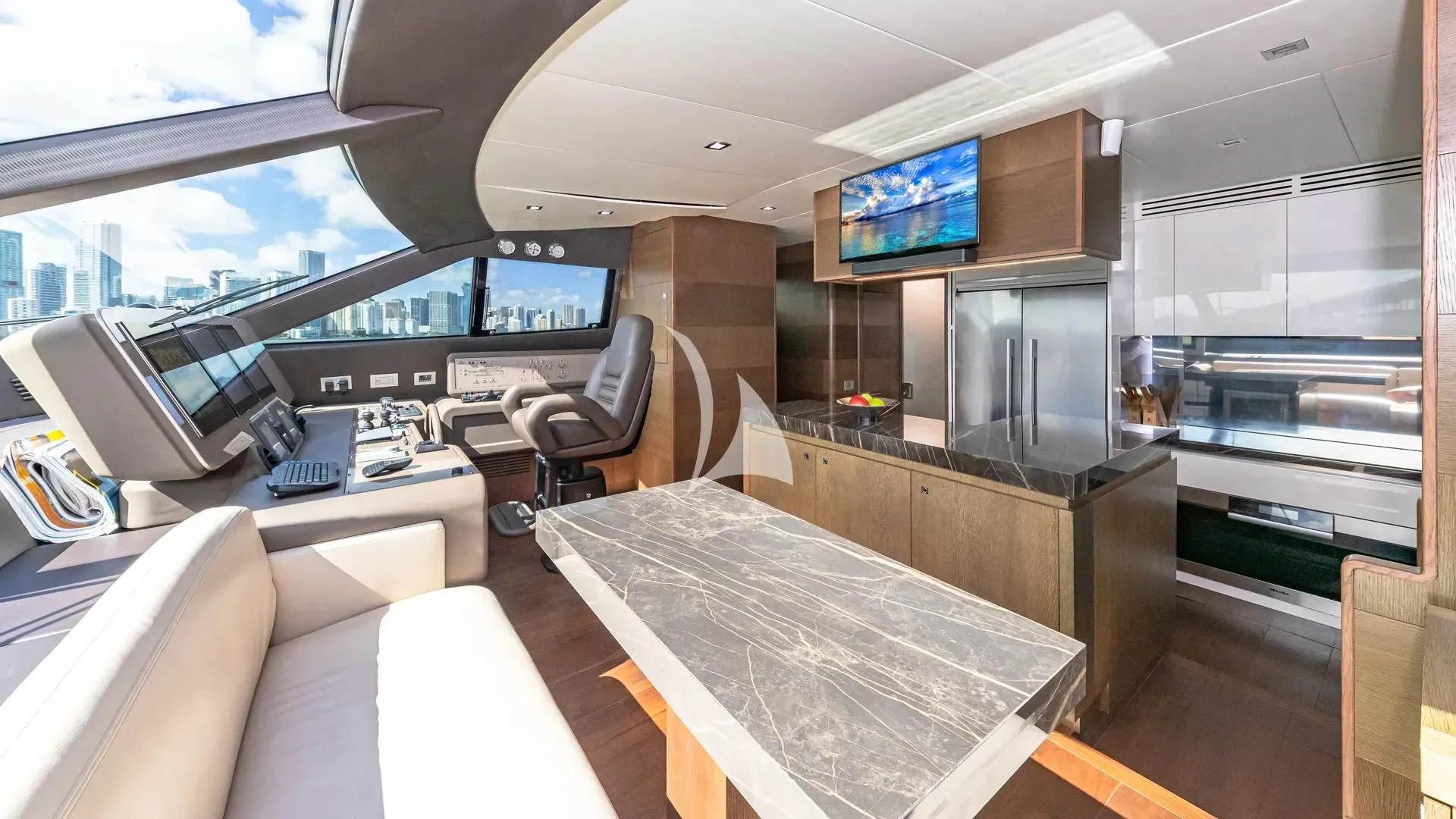 a room with a table and chairs aboard HOYA SAXA Yacht for Sale