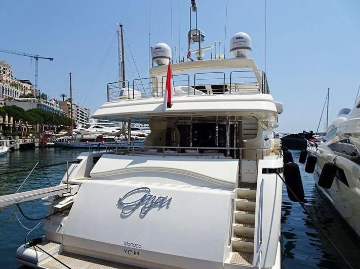a boat docked at a pier aboard GAZOU Yacht for Sale