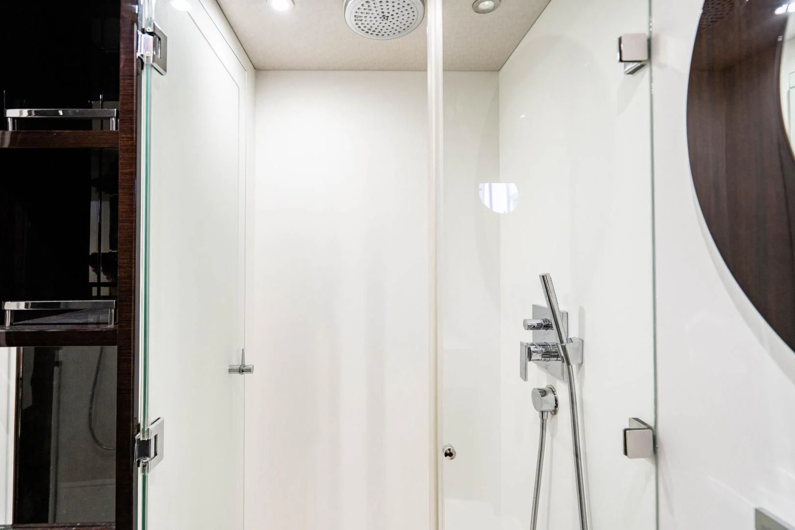 a bathroom with a shower unit aboard YOLO Yacht for Sale