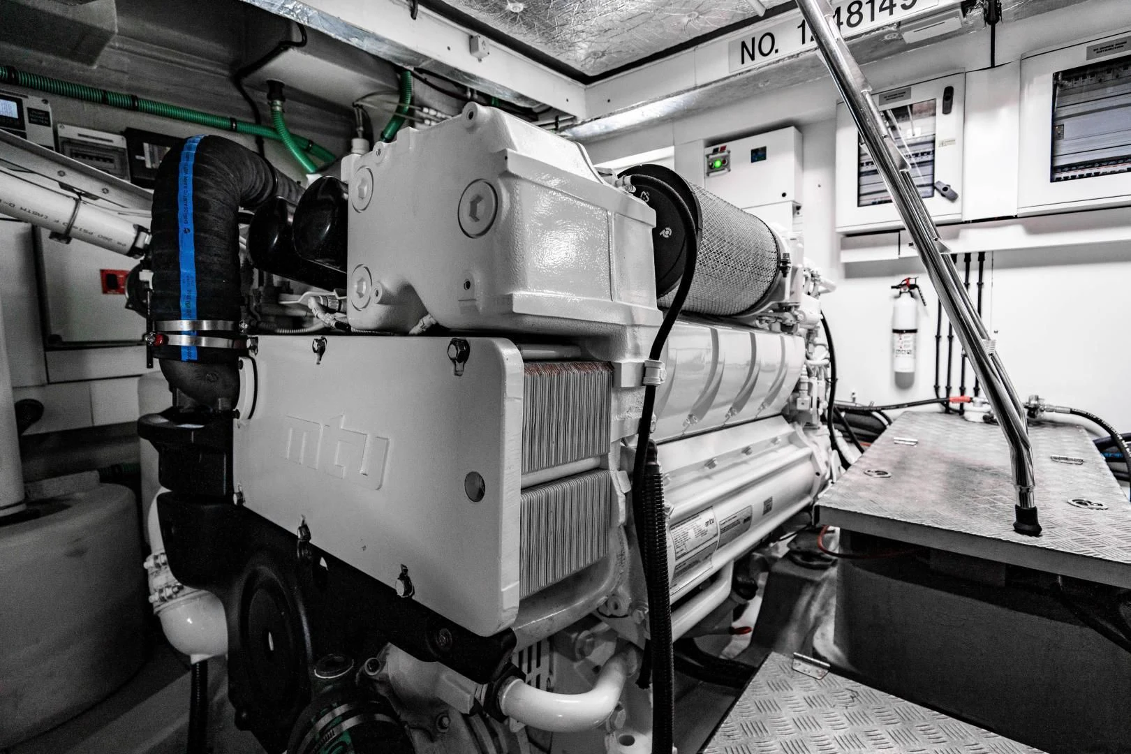 a large machine in a factory aboard YOLO Yacht for Sale