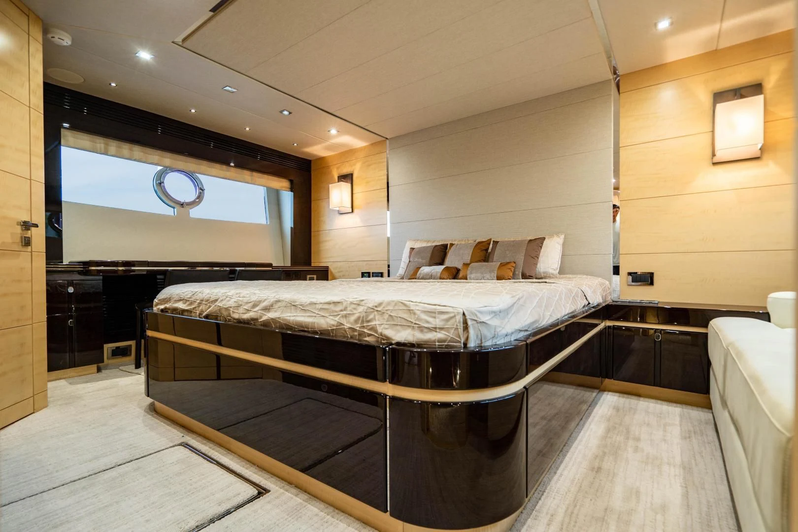 a bed in a room aboard YOLO Yacht for Sale