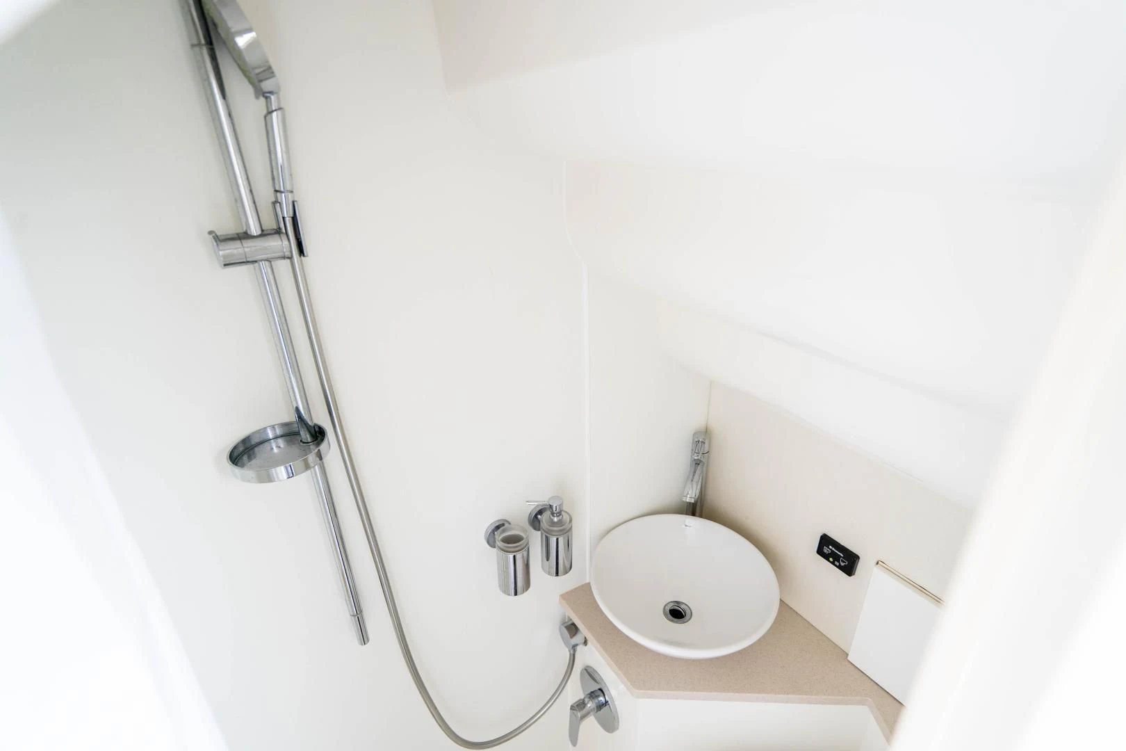 a shower unit and sink aboard YOLO Yacht for Sale