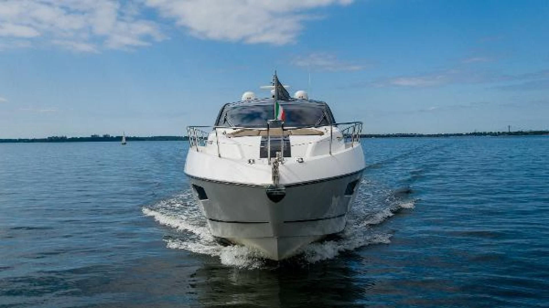 a boat on the water aboard YOLO Yacht for Sale