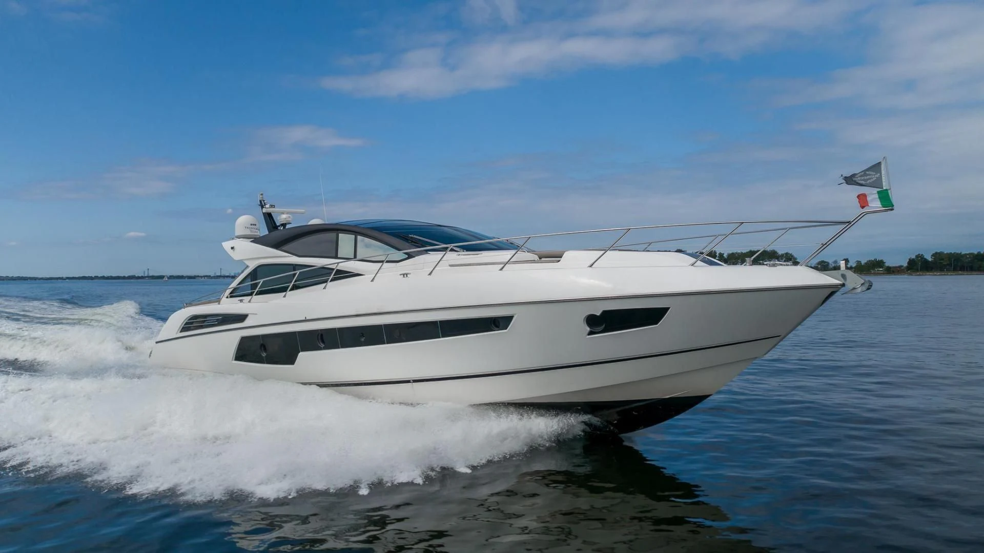 a boat on the water aboard YOLO Yacht for Sale