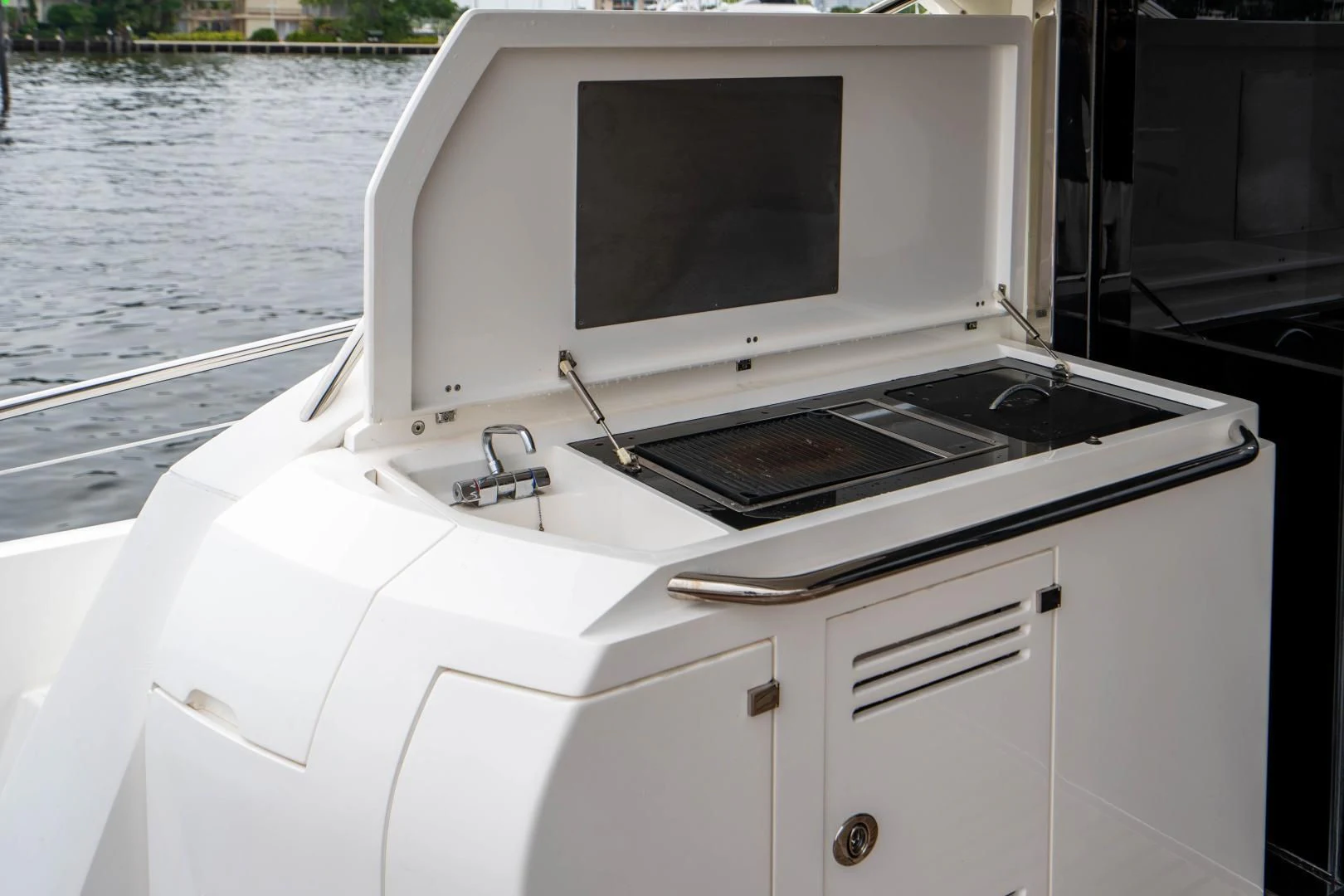 a white microwave on a boat aboard YOLO Yacht for Sale