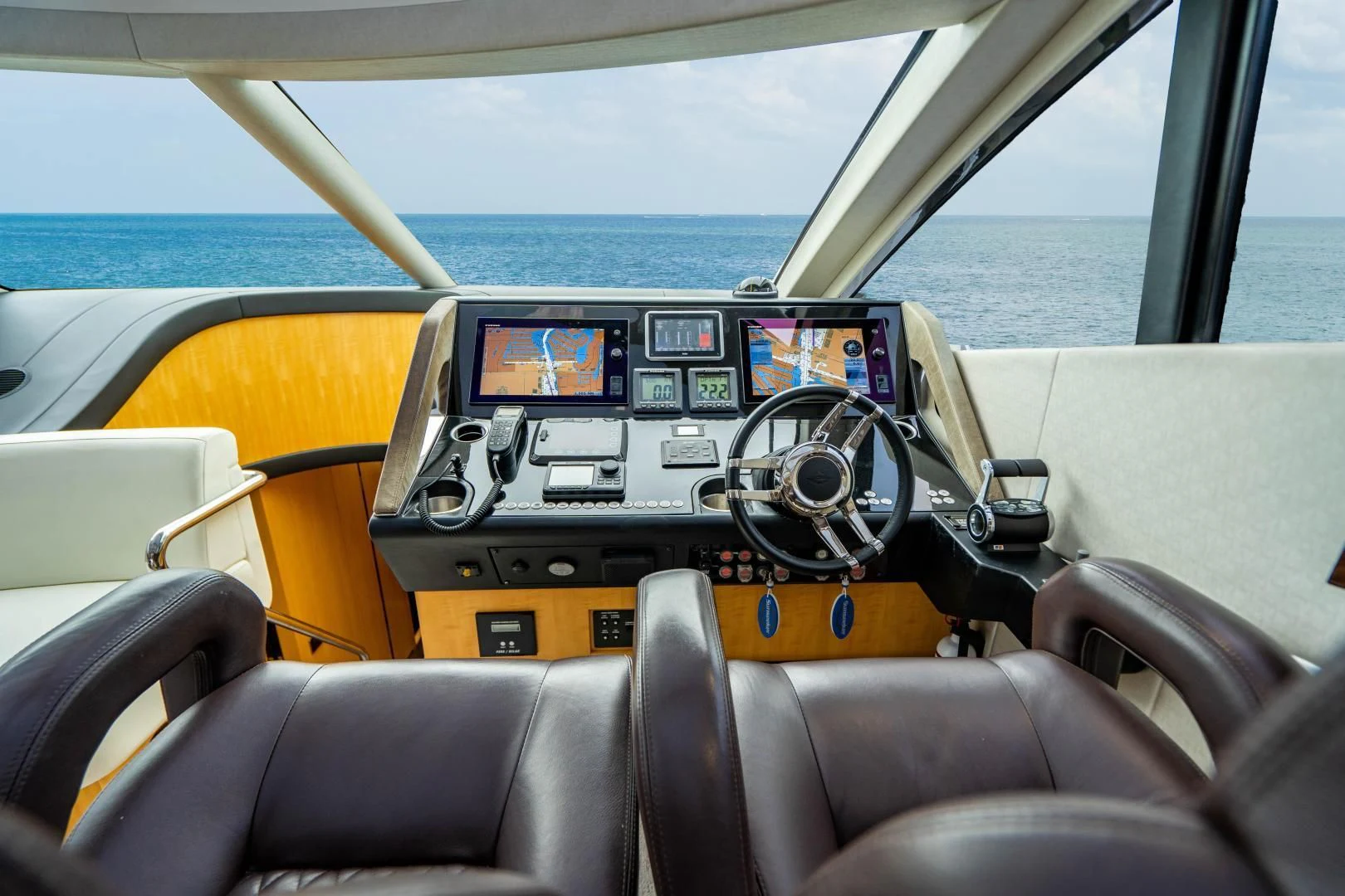the inside of a car aboard YOLO Yacht for Sale