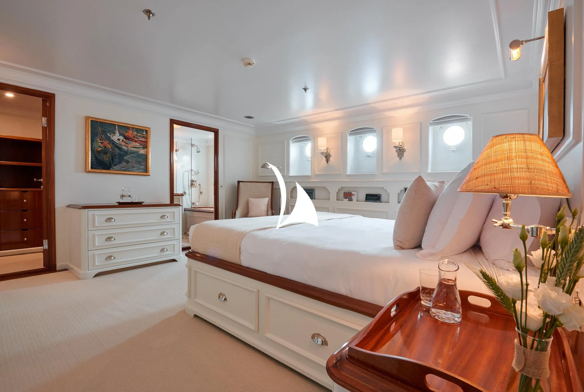 a hotel room with a bed and a table aboard HAIDA 1929 Yacht for Sale