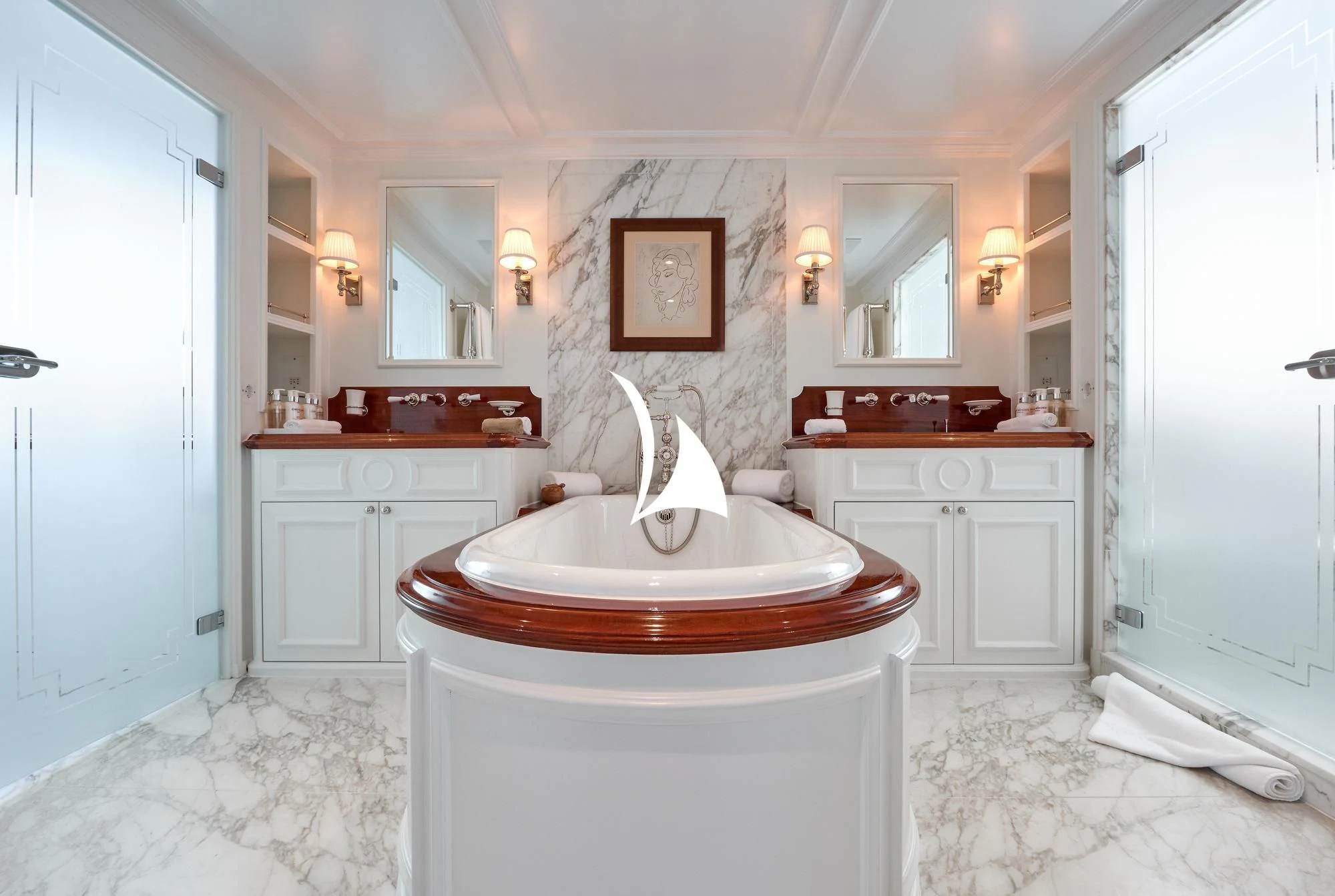 a bathroom with a sink and a mirror aboard HAIDA 1929 Yacht for Sale