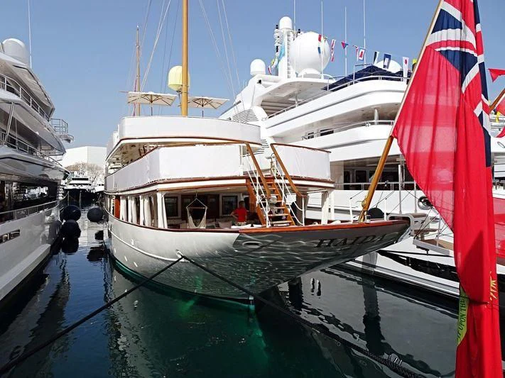 boats docked in a harbor aboard HAIDA 1929 Yacht for Sale