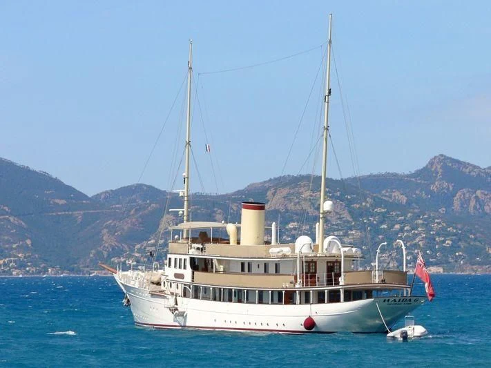 a boat in the water aboard HAIDA 1929 Yacht for Sale