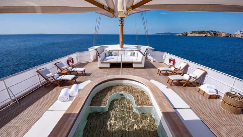 a lounge area on a boat aboard HAIDA 1929 Yacht for Sale