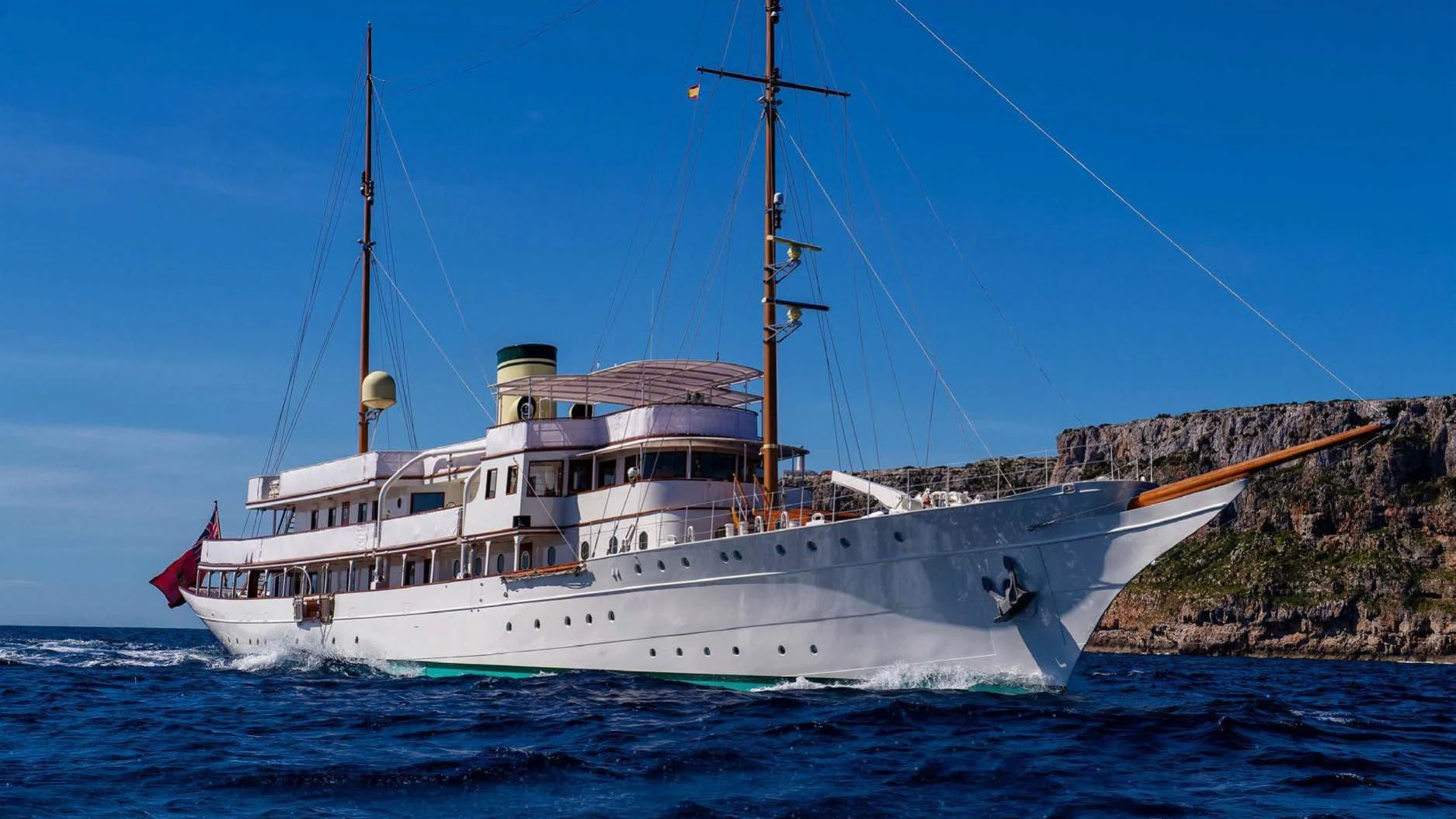 a boat on the water aboard HAIDA 1929 Yacht for Sale