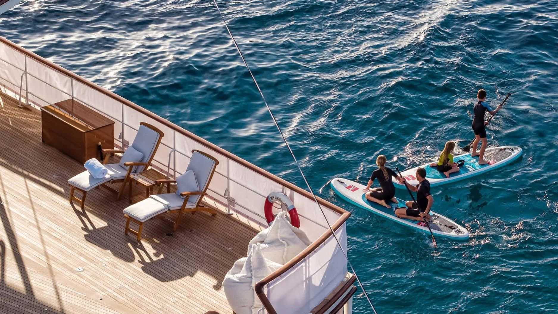 a group of people on a boat aboard HAIDA 1929 Yacht for Sale