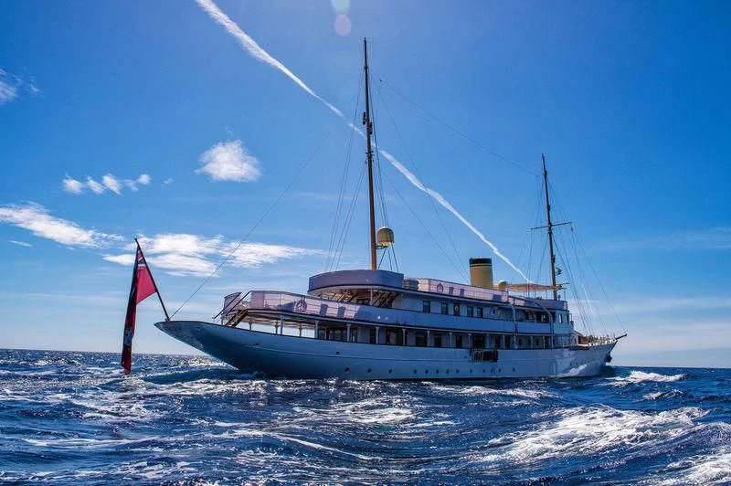 a large boat in the water aboard HAIDA 1929 Yacht for Sale