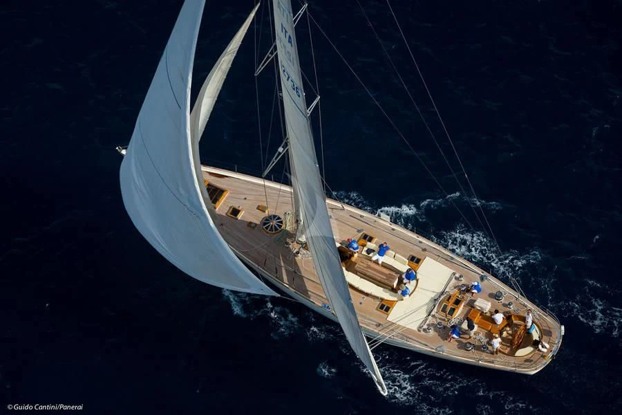 a boat with a sail aboard WHITEFIN Yacht for Sale