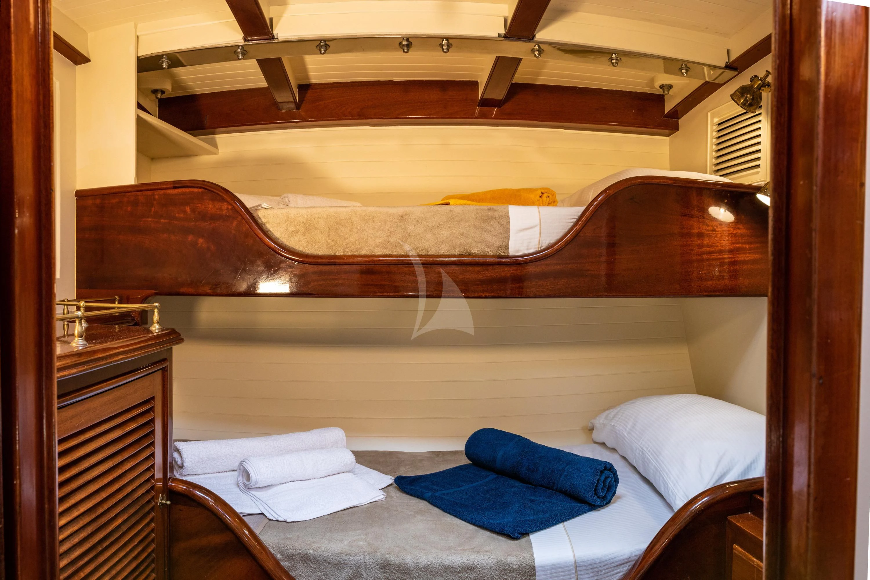 a bed with a wooden canopy aboard WHITEFIN Yacht for Sale