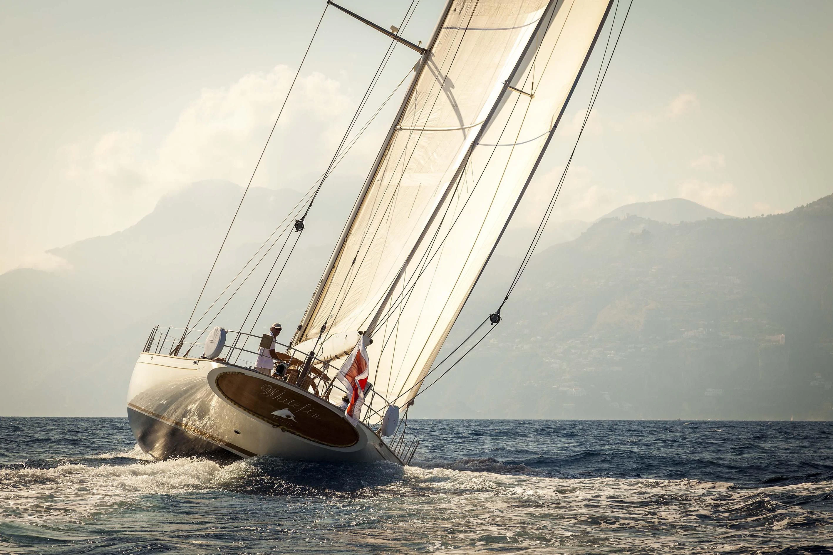 a sailboat on the water aboard WHITEFIN Yacht for Sale