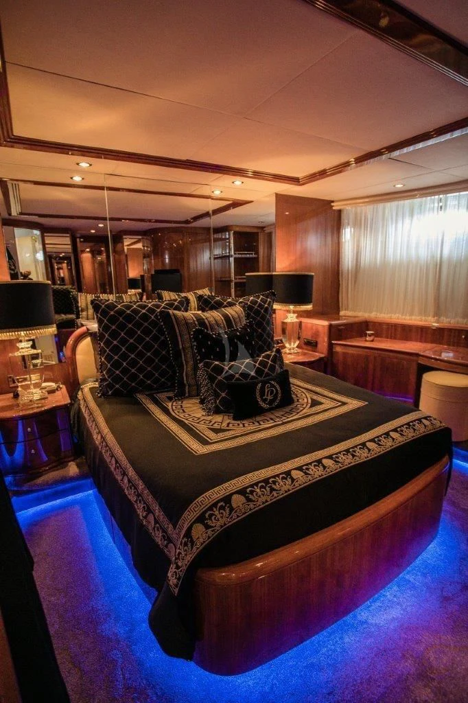 a living room with a couch aboard LADY PAMELA Yacht for Sale