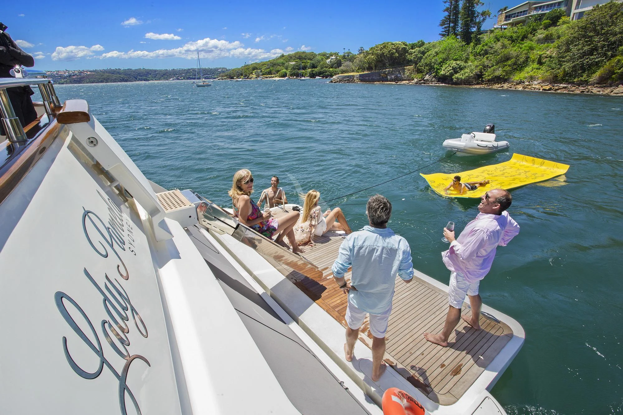 a group of people on a boat aboard LADY PAMELA Yacht for Sale