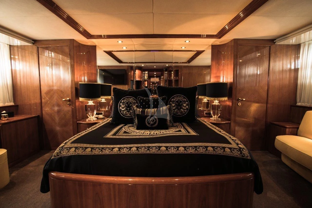 a bar with a table and chairs aboard LADY PAMELA Yacht for Sale